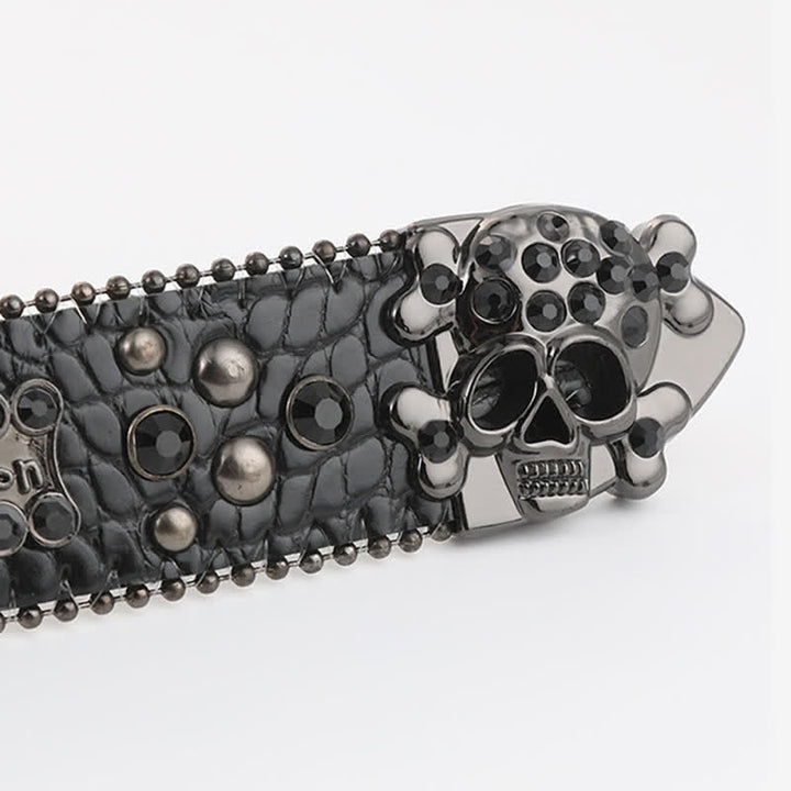Ceinture en cuir avec mini tête de mort et rivets en strass