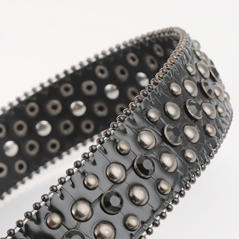 Ceinture en cuir avec mini tête de mort et rivets en strass