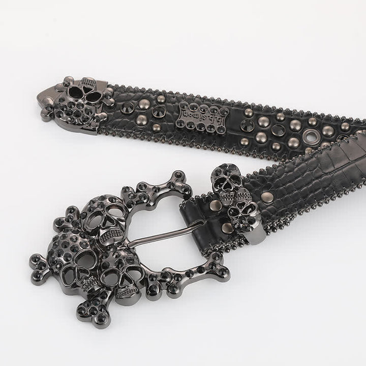 Ceinture en cuir avec mini tête de mort et rivets en strass