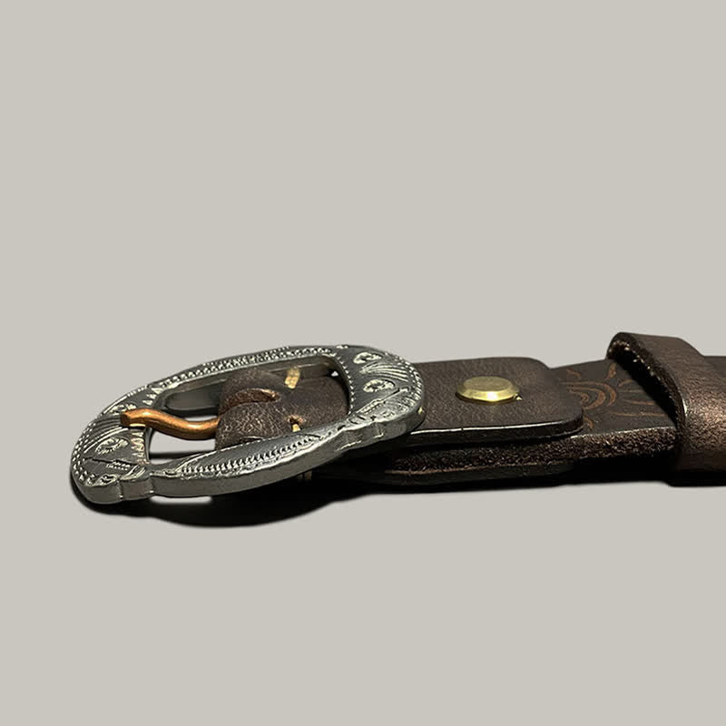 Ceinture en cuir avec boucle argentée et motif soleil rétro en relief