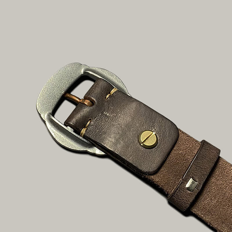 Ceinture en cuir avec boucle argentée et motif soleil rétro en relief