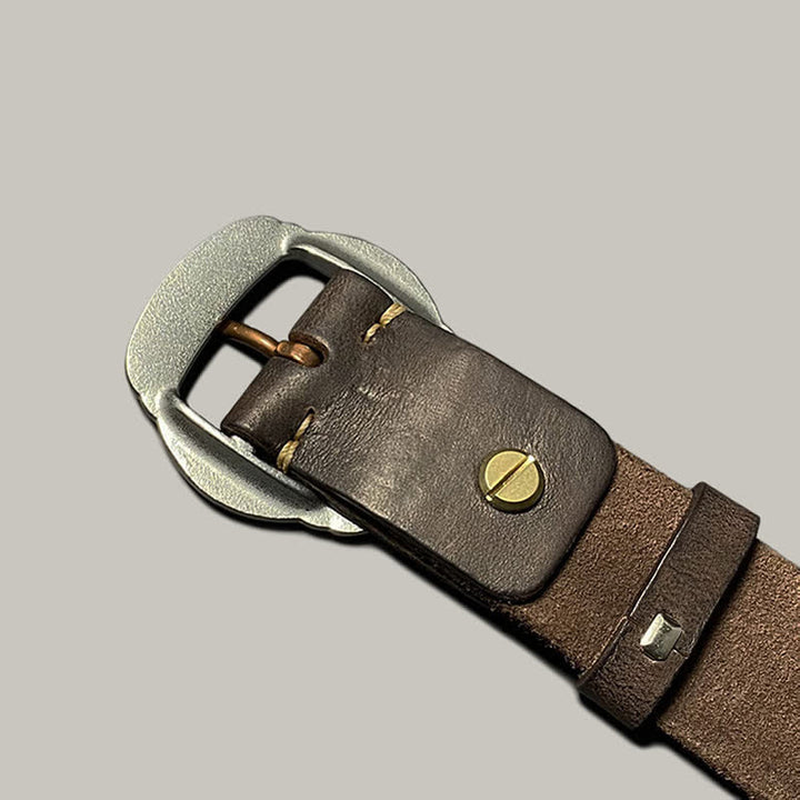 Ceinture en cuir avec boucle argentée et motif soleil rétro en relief
