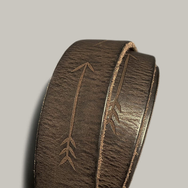 Ceinture en cuir avec boucle argentée et motif soleil rétro en relief