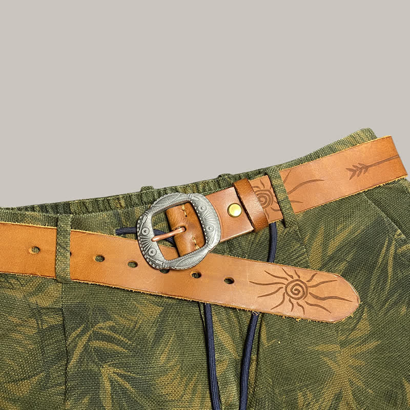 Ceinture en cuir avec boucle argentée et motif soleil rétro en relief