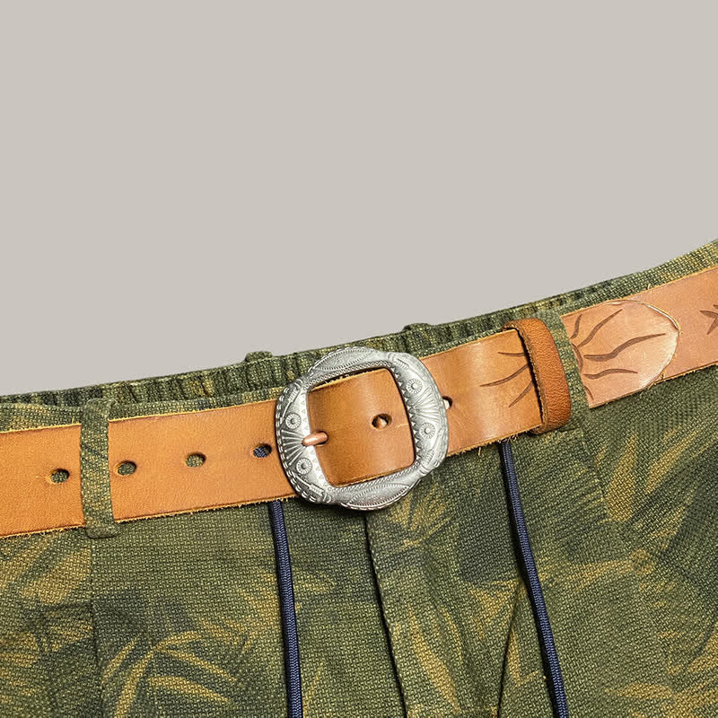 Ceinture en cuir avec boucle argentée et motif soleil rétro en relief