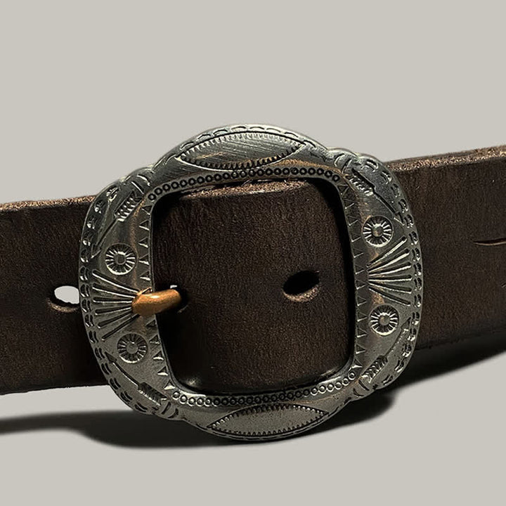 Ceinture en cuir avec boucle argentée et motif soleil rétro en relief