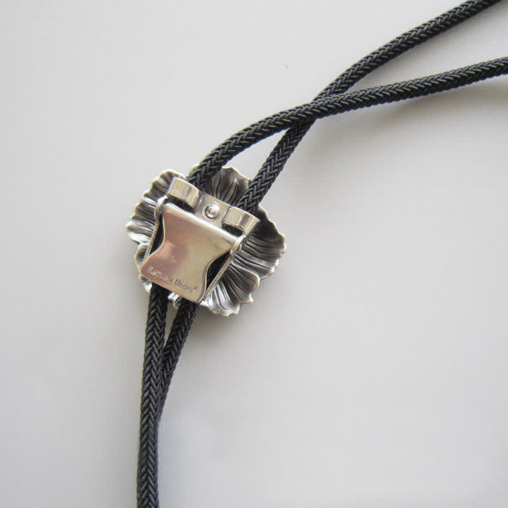 Cravate bolo en forme de fleur avec strass en faux cristal bleu