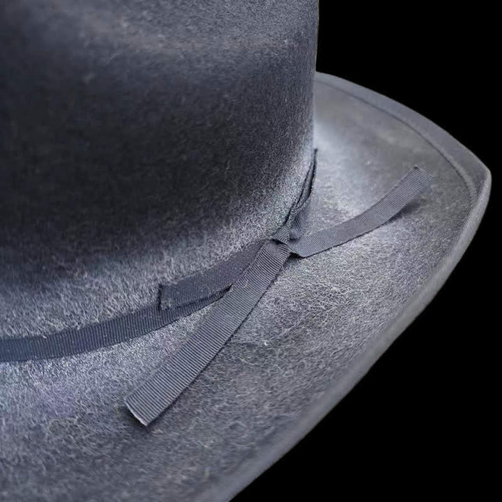 Chapeau de cowboy en laine noire avec noeud papillon vieilli