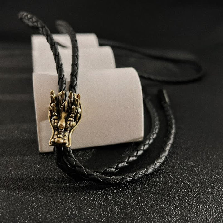 Cravate bolo en bronze avec petite tête de dragon