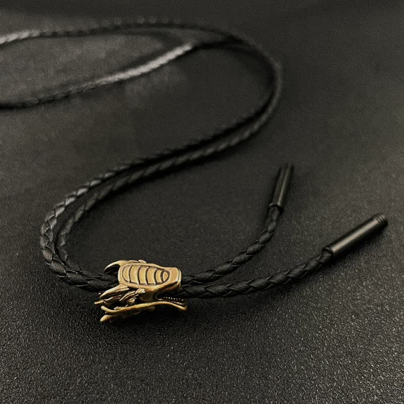 Cravate bolo en bronze avec petite tête de dragon