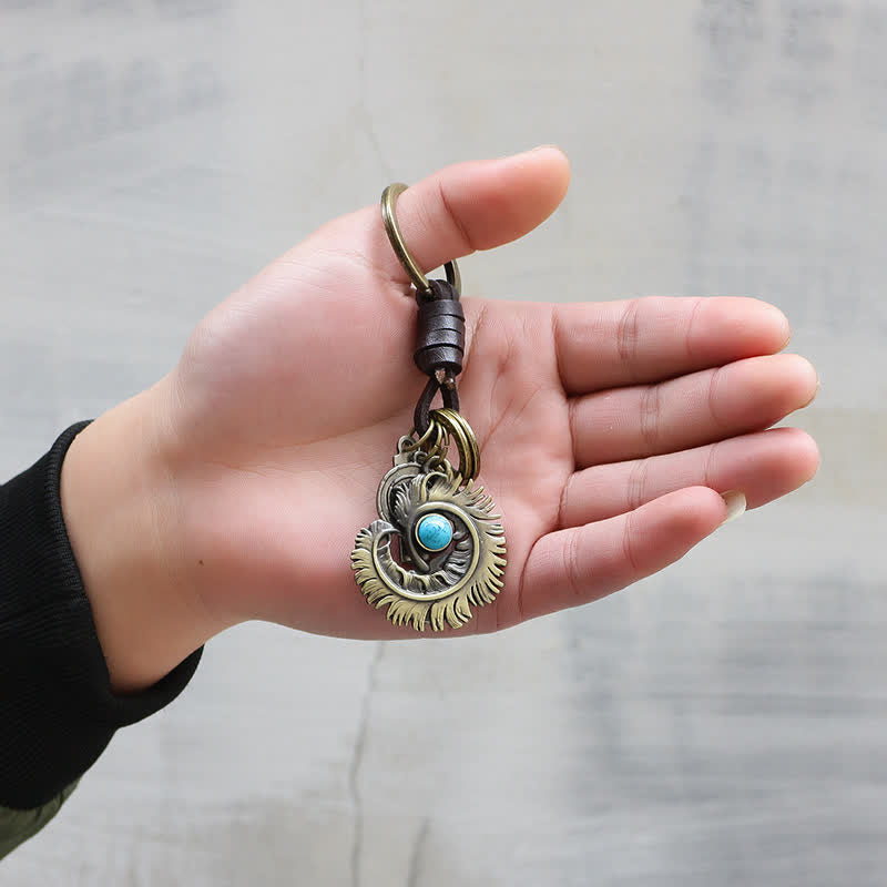 Porte-clés en cuir artificiel bleu turquoise avec queue de phénix - image 1