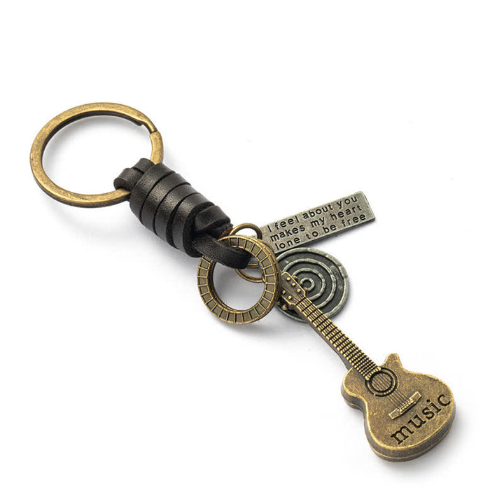 Porte-clés en cuir avec pendentif en forme de guitare musicale