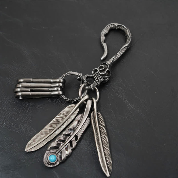 Porte-clés en cuir bleu turquoise avec plumes de crâne Boho