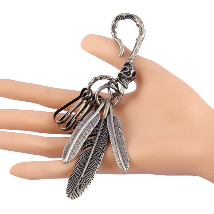 Porte-clés en cuir bleu turquoise avec plumes de crâne Boho