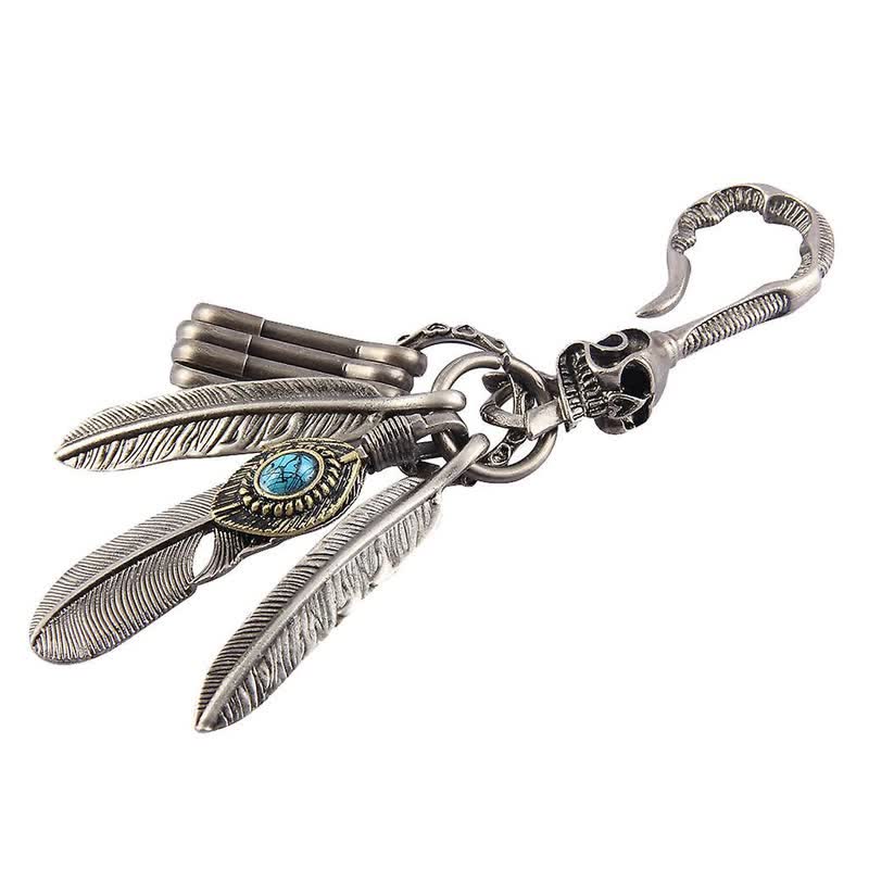 Porte-clés en cuir bleu turquoise avec plumes de crâne Boho