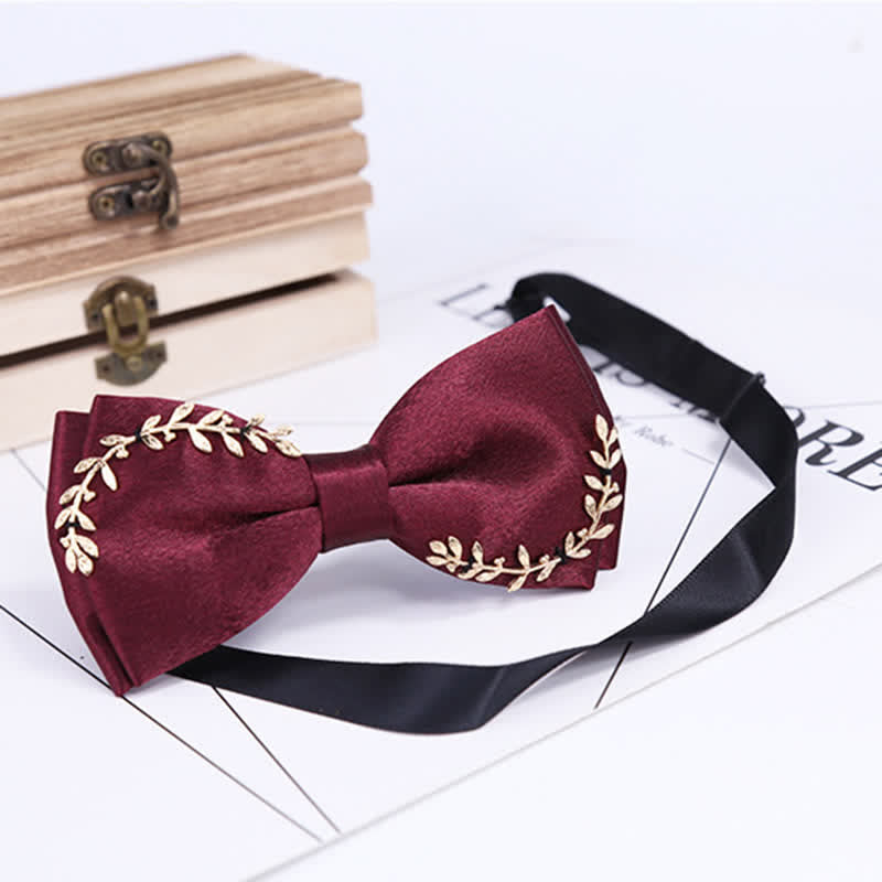 Nœud papillon pour homme avec appliques dorées et décoration en feuille de métal
