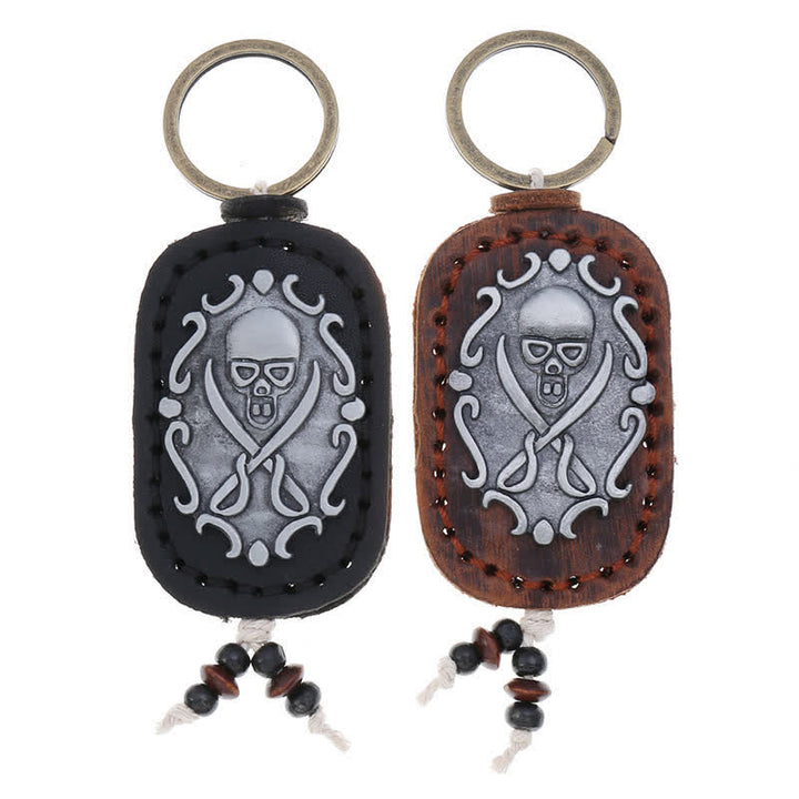 Porte-clés en cuir avec pendentif tête de mort et épées doubles