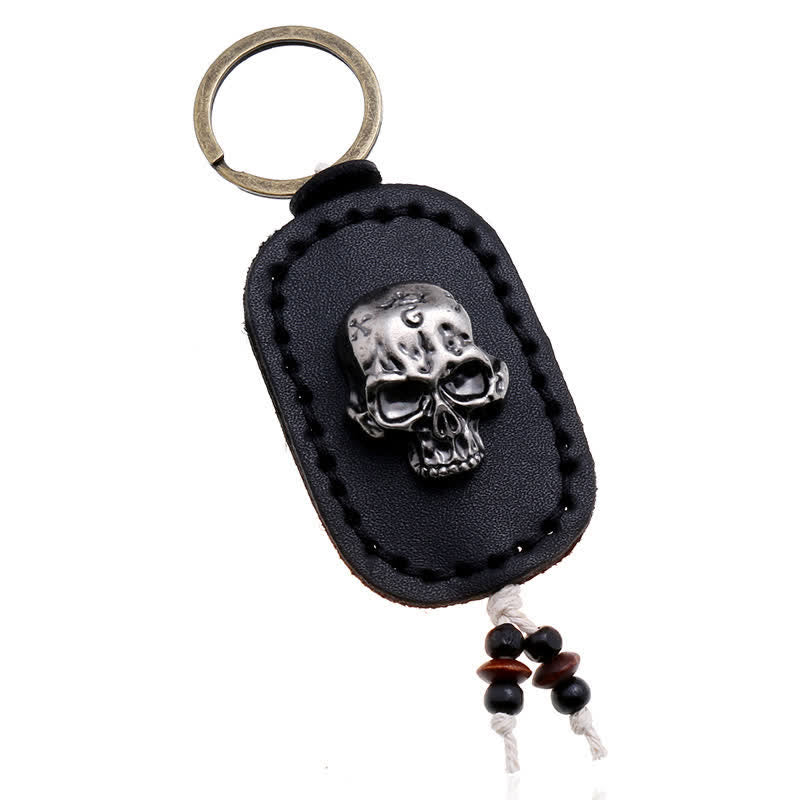 Porte-clés en cuir avec pendentif en forme de crâne punk 3D