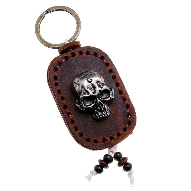 Porte-clés en cuir avec pendentif en forme de crâne punk 3D