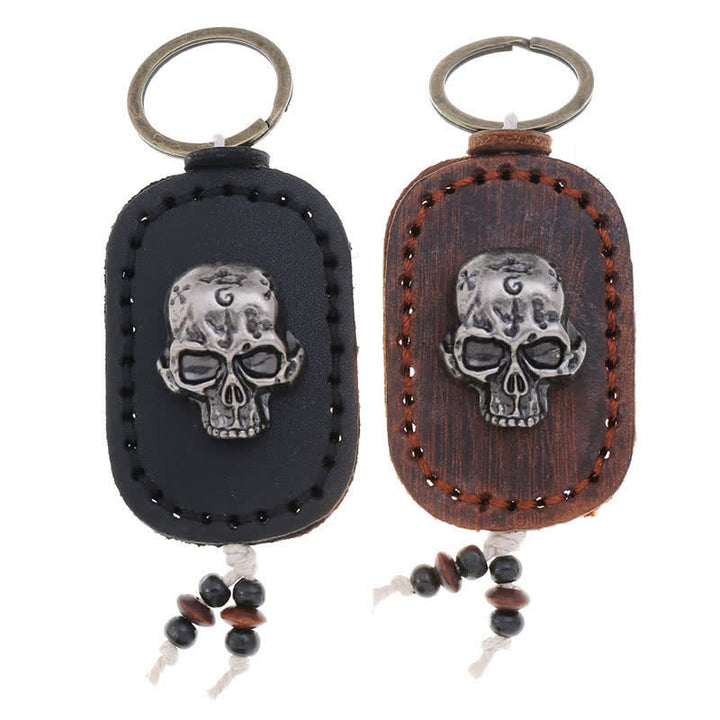 Porte-clés en cuir avec pendentif en forme de crâne punk 3D