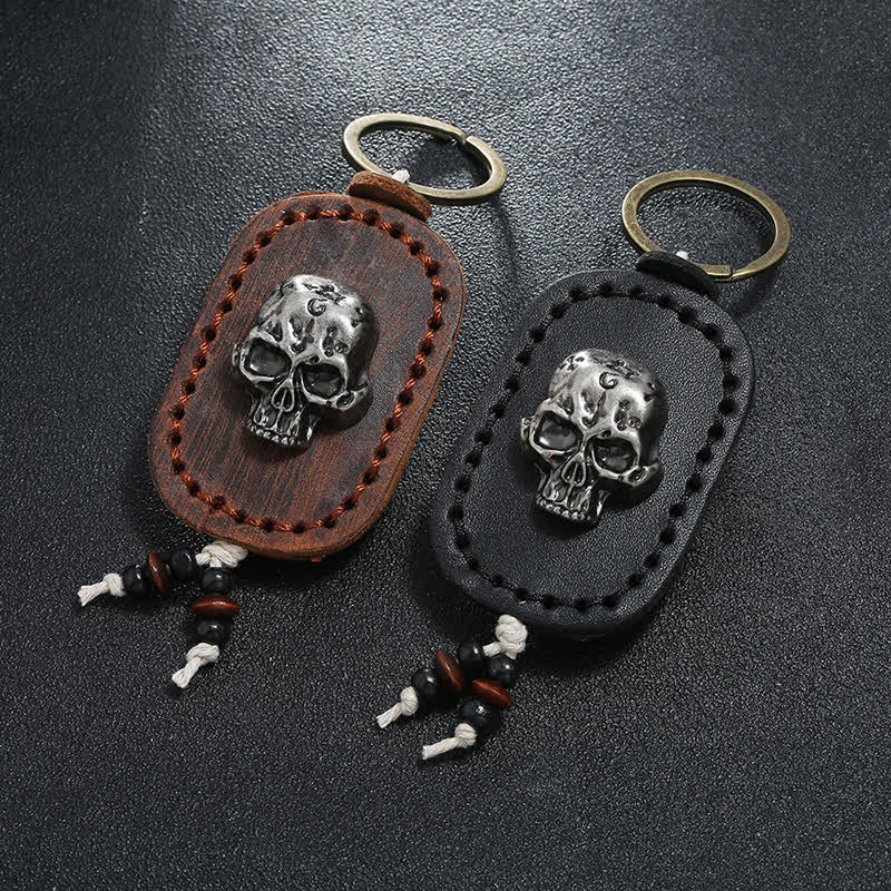 Porte-clés en cuir avec pendentif en forme de crâne punk 3D