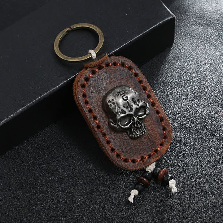 Porte-clés en cuir avec pendentif en forme de crâne punk 3D