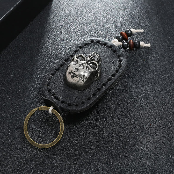 Porte-clés en cuir avec pendentif en forme de crâne punk 3D