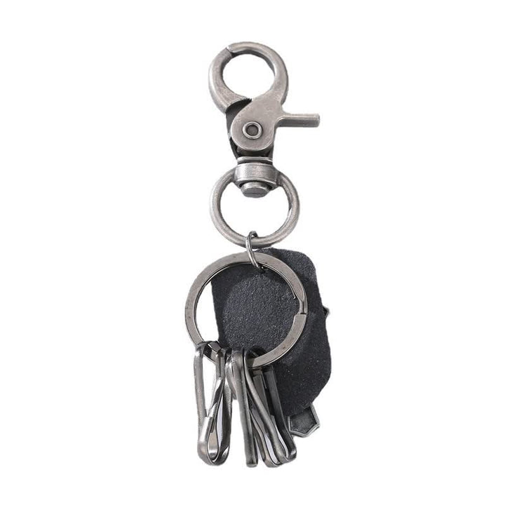 Porte-clés rétro en cuir avec motif de croix suspendu