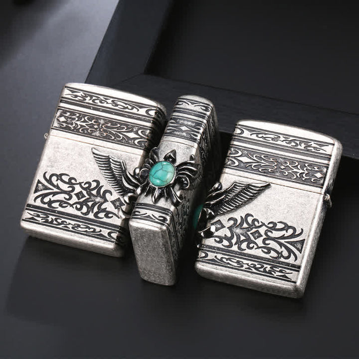 Briquet à pétrole rechargeable avec ailes d'aigle et incrustations de turquoise