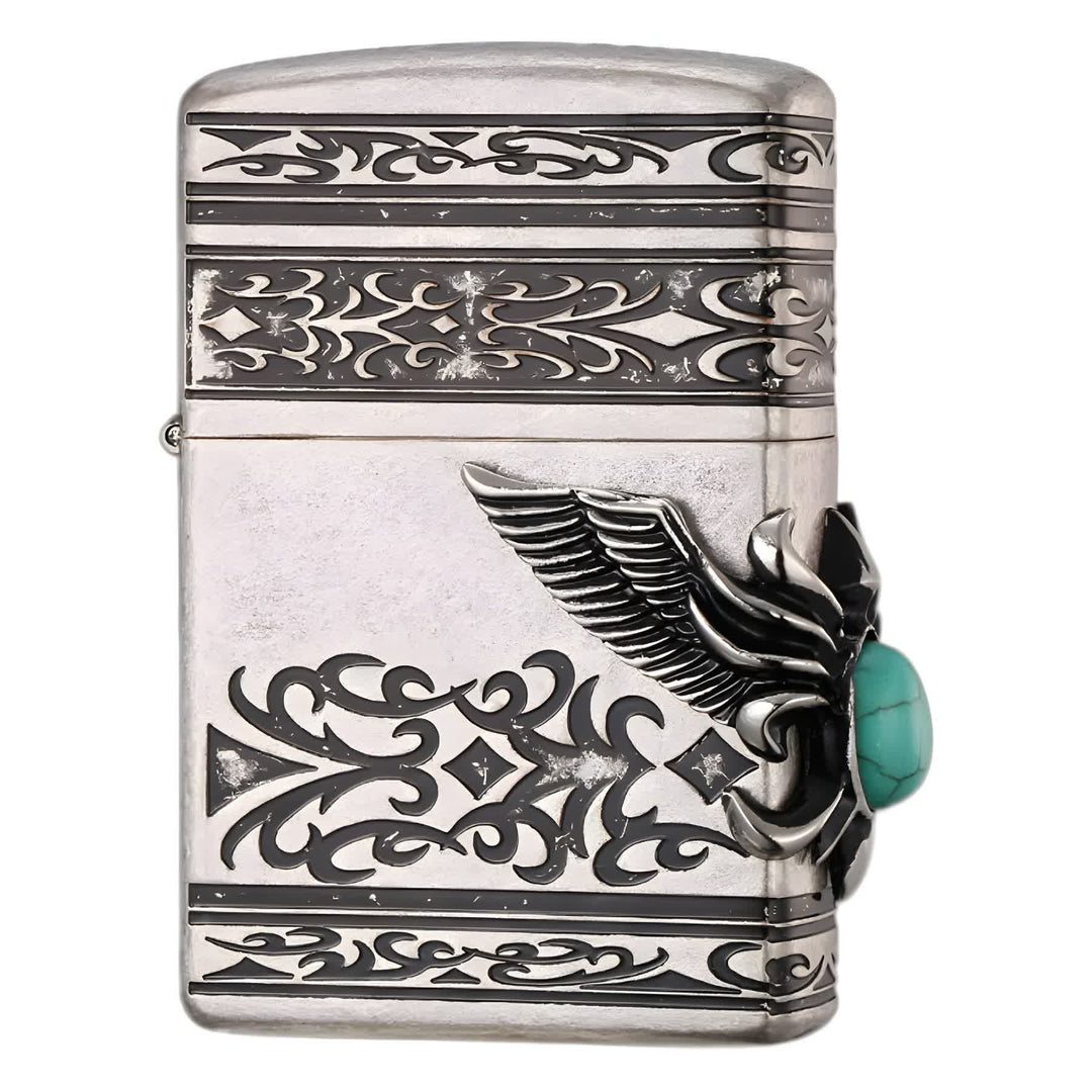 Briquet à pétrole rechargeable avec ailes d'aigle et incrustations de turquoise