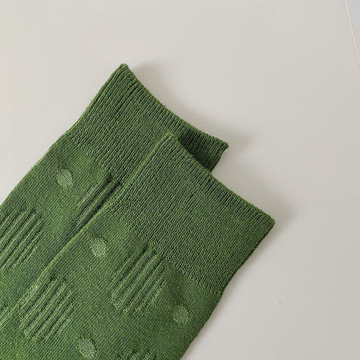 Chaussettes mi-mollet classiques en coton à pois de couleur unie