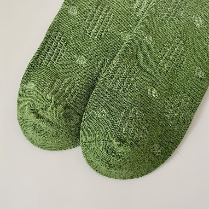 Chaussettes mi-mollet classiques en coton à pois de couleur unie