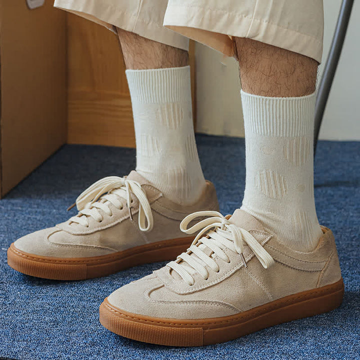 Chaussettes mi-mollet classiques en coton à pois de couleur unie