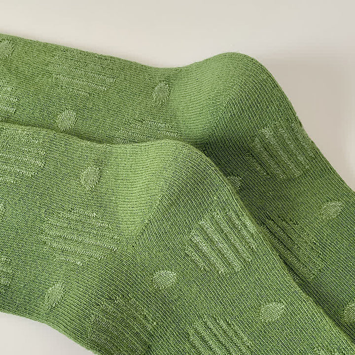 Chaussettes mi-mollet classiques en coton à pois de couleur unie