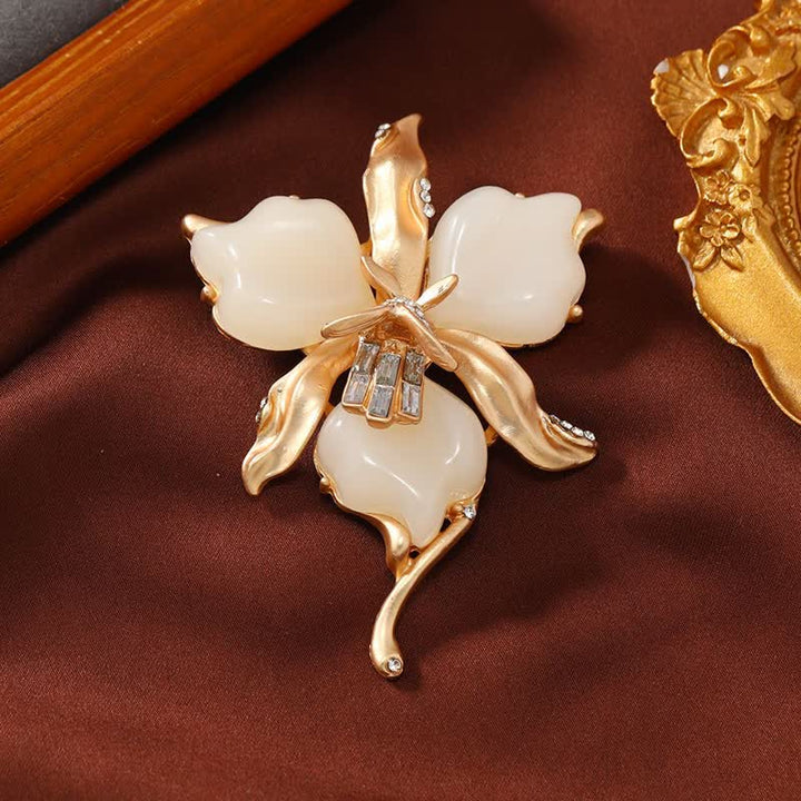 Broche en laiton métallique pour femme en forme de pétale de fleur d'orchidée en résine