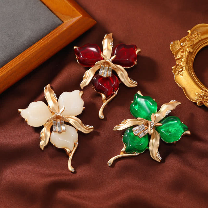 Broche en laiton métallique pour femme en forme de pétale de fleur d'orchidée en résine