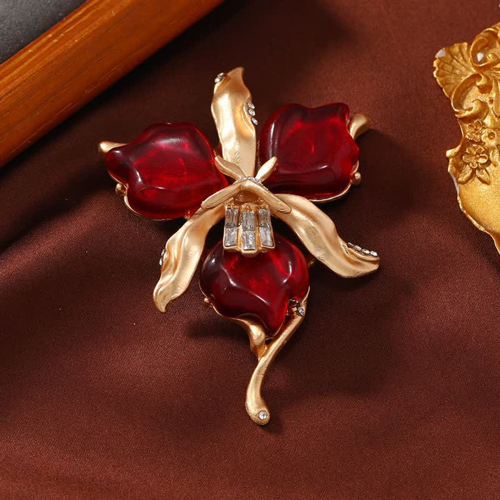 Broche en laiton métallique pour femme en forme de pétale de fleur d'orchidée en résine