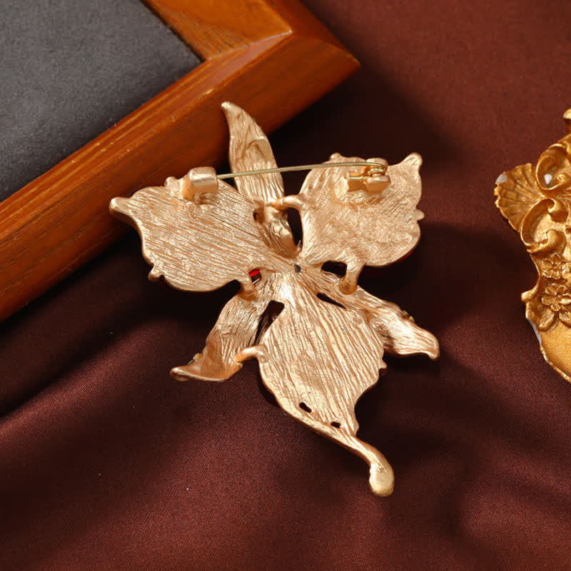 Broche en laiton métallique pour femme en forme de pétale de fleur d'orchidée en résine