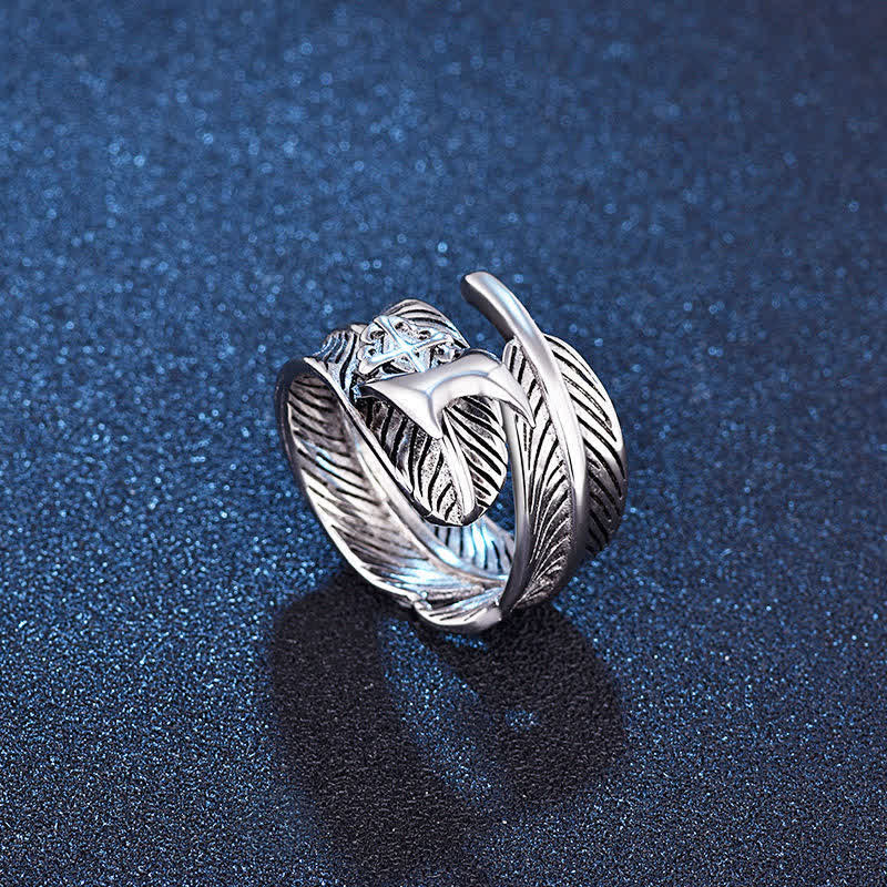 Bague réglable à lame cachée en forme de croix en plumes