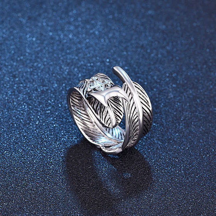Bague réglable à lame cachée en forme de croix en plumes