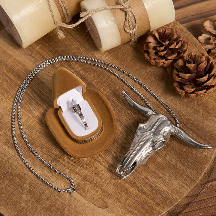Ensemble de pendentifs et d'anneaux à lame cachée en forme de taureau à longues cornes