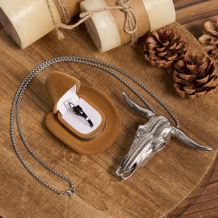 Ensemble de pendentifs et d'anneaux à lame cachée en forme de taureau à longues cornes