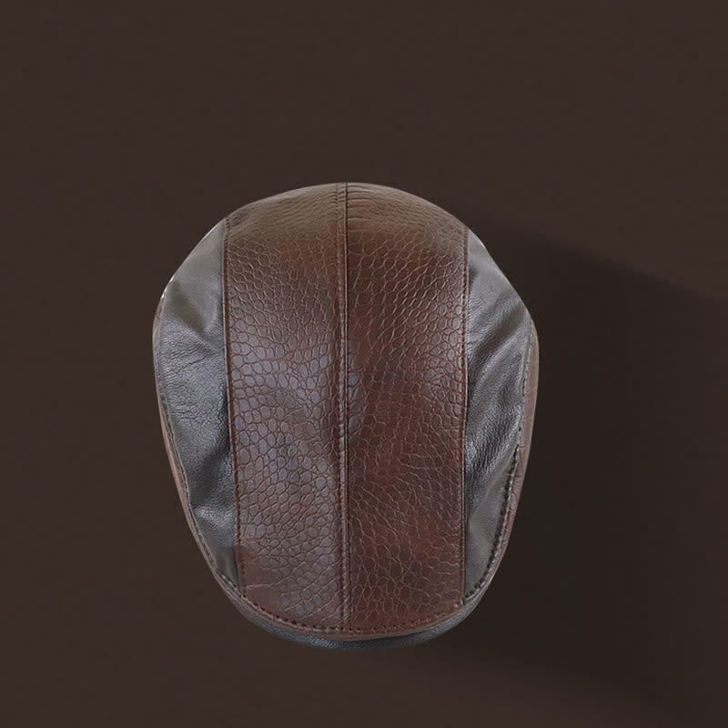 Béret en cuir à imprimé alligator et coutures vintage