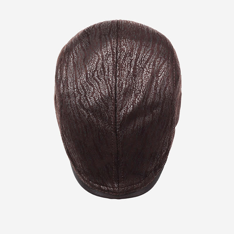 Béret en cuir à imprimé unique et ajustable sur le côté