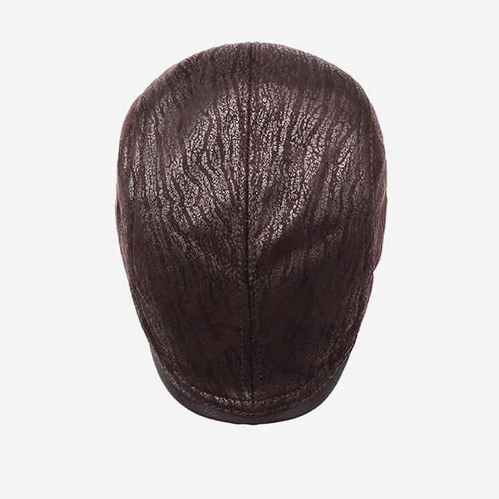 Béret en cuir à imprimé unique et ajustable sur le côté