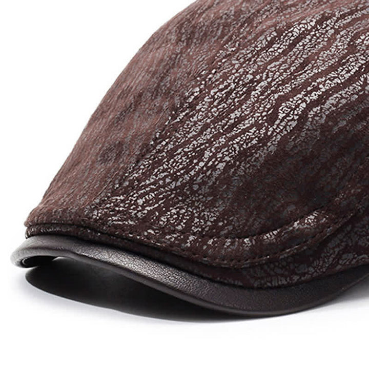 Béret en cuir à imprimé unique et ajustable sur le côté