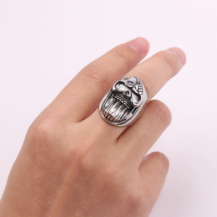 Bague décapsuleur tête de mort gothique riante