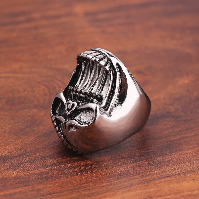 Bague décapsuleur tête de mort gothique riante