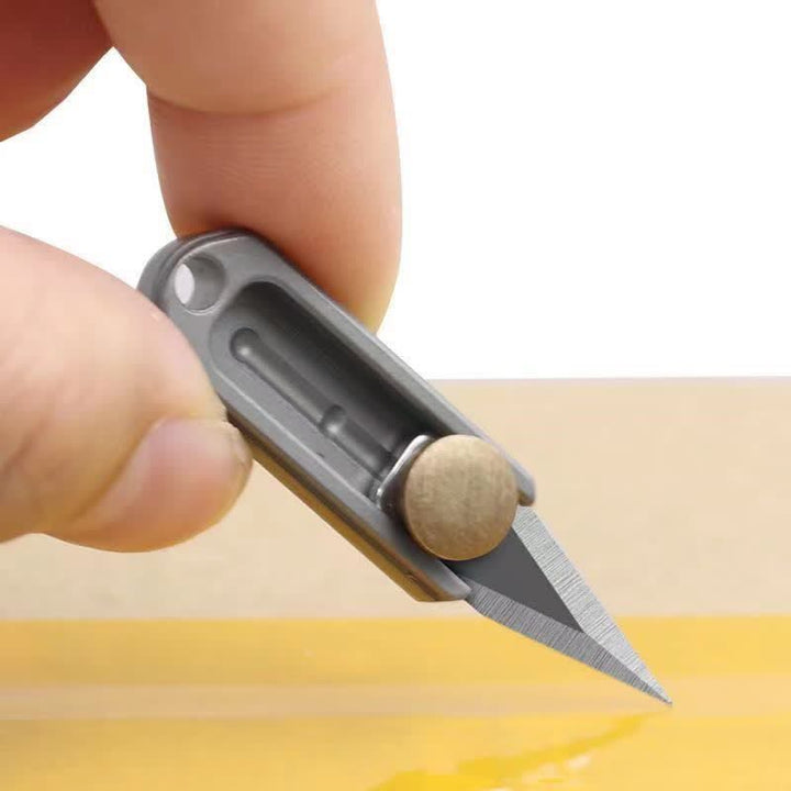 Porte-clés mini-lame à pousser en laiton EDC Tool