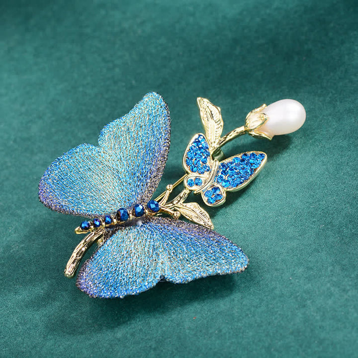 Broche en perles d'eau douce avec papillon brodé pour femme